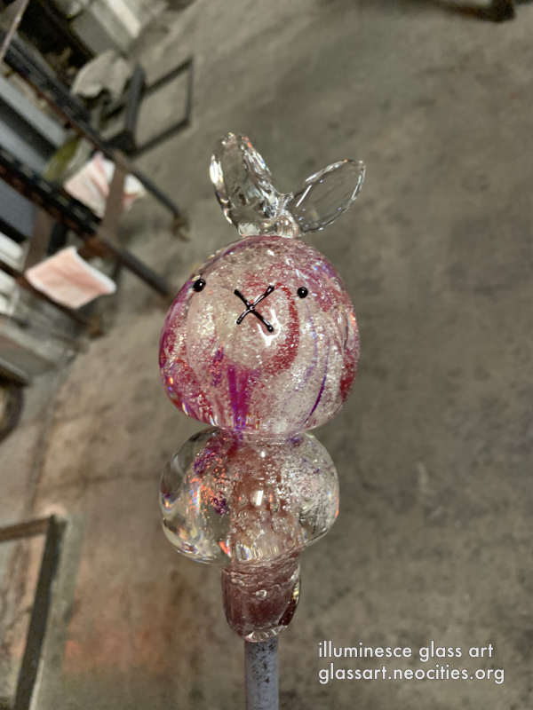An image of hot glass in the form of a rabbit.
